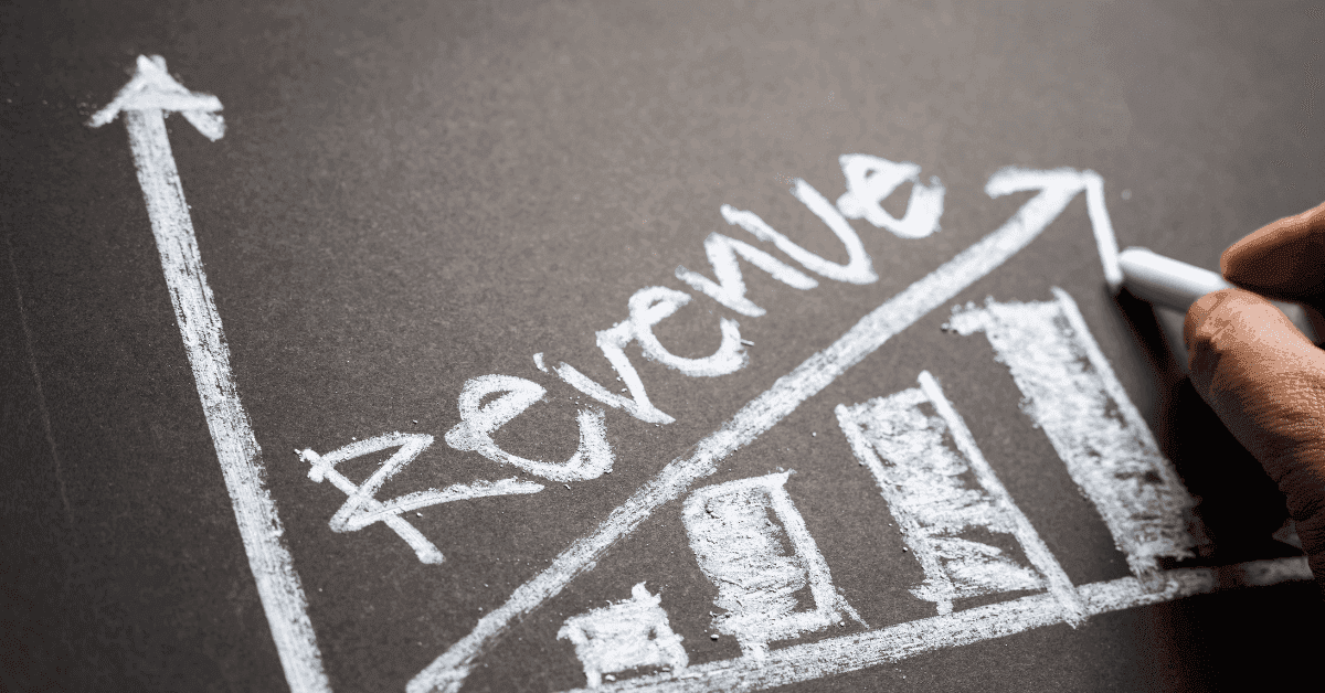 a chalkboard drawing of a chart indicating increased revenue