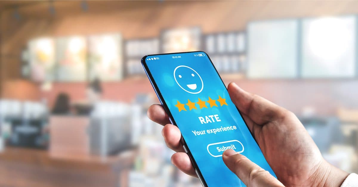 a person giving a 5 star review on a mobile device